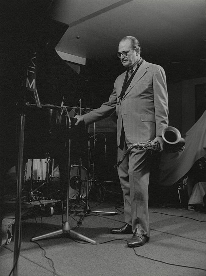 Paul J. Hoeffler, Al Cohn, 1987
Gelatin silver print; printed later, 11 x 14 in. (27.9 x 35.6 cm)
A musician-insider, Al Cohn (1925-1988) was a tenor saxophonist who came to prominence in Woody Herman's big band - also known for his longtime musical partnership with fellow saxophonist Zoot Sims.  Signed by the photographer. 
7373
$300