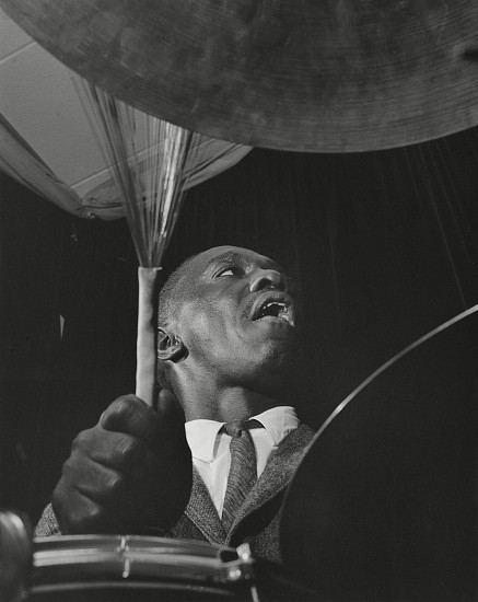 Paul J. Hoeffler, Art Blakey at Ridgecrest Inn, 1958
Gelatin silver print; printed later, 19 x 15 in. (48.3 x 38.1 cm)
The dynamic Art Blakey (1919-1990), an extraordinary drummer and bandleader, was a bebop pioneer with Thelonious Monk, Charlie Parker, and Dizzy Gillespie. He led the Jazz Messengers, for 35 years, and a mentor for young talent, including Freddie Hubbard, Wayne Shorter, and Wynton Marsalis. Signed by the photographer.
7379
Sold