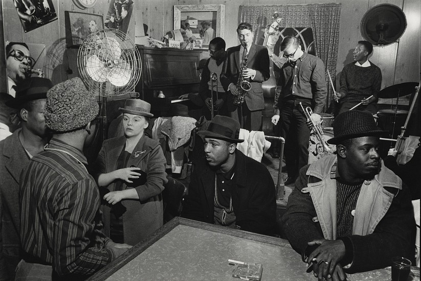 Paul J. Hoeffler, Friday Night at the Pythodd Club, Rochester NY, c. 1959
Gelatin silver print; printed later, 11 x 14 in. (27.9 x 35.6 cm)
An evocative image by Paul Hoeffler, capturing the atmosphere of the legendary Pythodd jazz club in Rochester, NY. With Dick Sampson, Jon Eckhardt, Roy McCurdy and other musicians on the bandstand.  Signed by the photographer.
7384
Sold