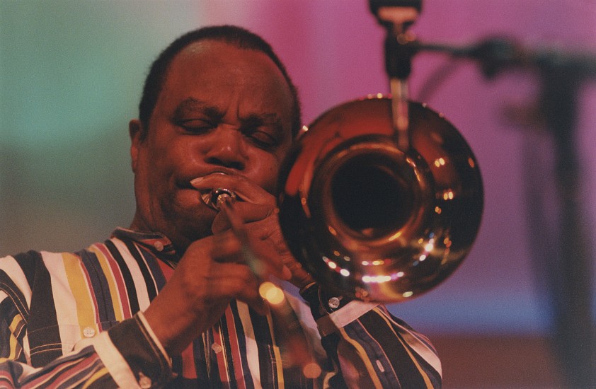 Paul J. Hoeffler, J.J. Johnson, Toronto Jazz Festival, at 'The Tent', 1995
Chromogenic print, 11 x 14 in. (27.9 x 35.6 cm)
J.J. Johnson (1924-2001) was one of the first trombonists to embrace bebop, recording with Max Roach, Sonny Stitt, Bud Powell, and Charlie Parker, among many. Considered by many to be the greatest jazz trombonist ever. Signed by the photographer.
7390
Sold