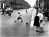 Roger Mayne, View With Footballers, Southam Street, London
1956, Gelatin silver print, printed 2001