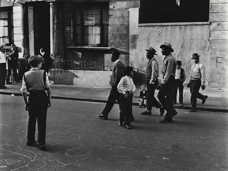 Roger Mayne, West Indians, Southam Street, North Kensington, London, 1956
Gelatin silver print; printed 1998, 13 5/8 x 18 1/4 in. (34.8 x 46.5 cm)
Signed and dated, with printing date in ink on recto, and notations in pencil on print verso. 
8369
$6,650
